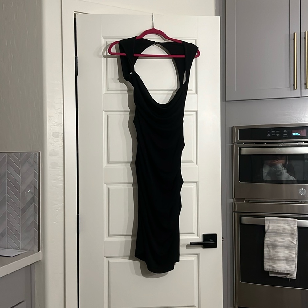 Medium length black dress